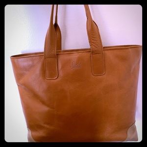 Sseko leather tote with laptop compartment